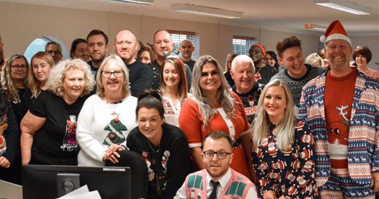 Gateway staff wearing Christmas jumpers