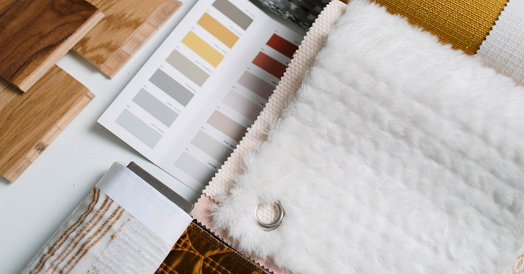 Pantone library with office paperwork