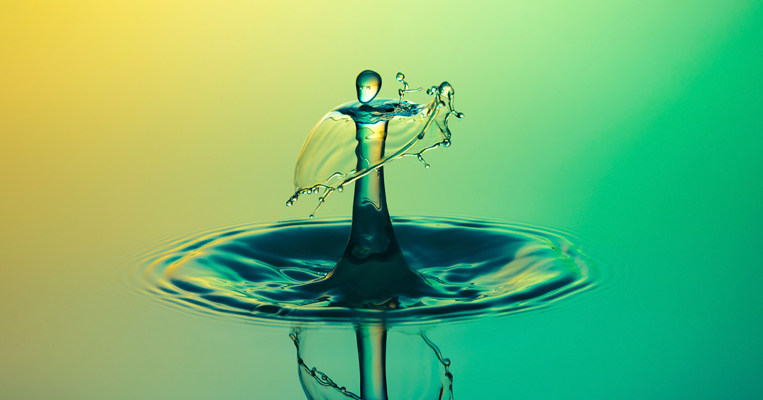 Water droplet bouncing on water