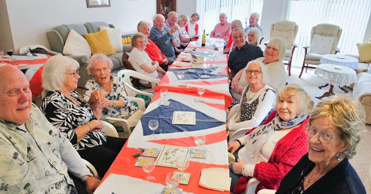 Eldery residents in communal area for seasonal activities
