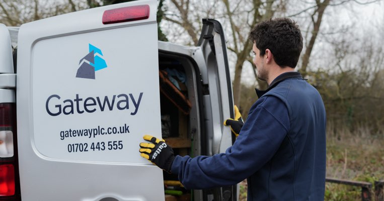Gateway employee opening back of transit van