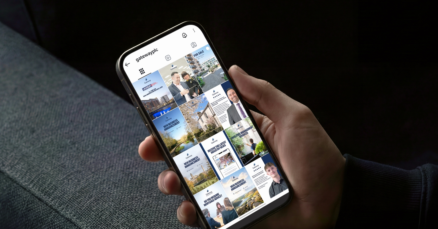 Person's hand holding mobile phone showing Gateway Instagram