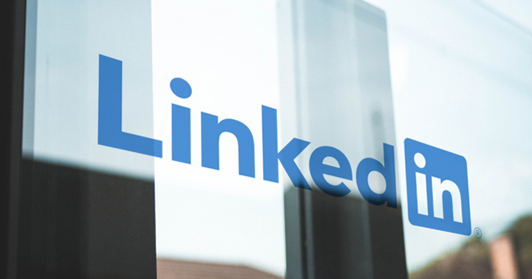 LinkedIn logo on Corporate building door