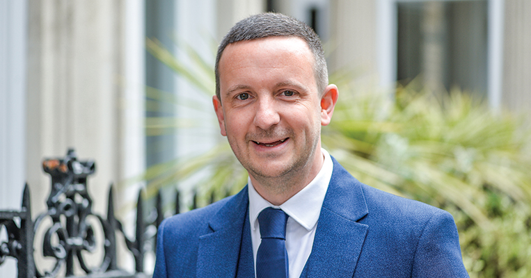 Gateway employee standing outside Mayfair, London office