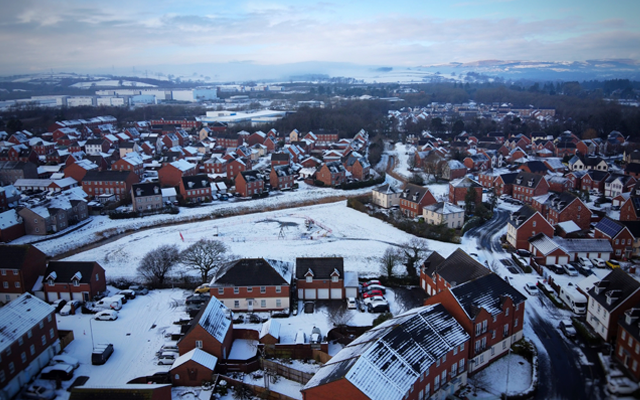 Aerial view of town covered in snow
